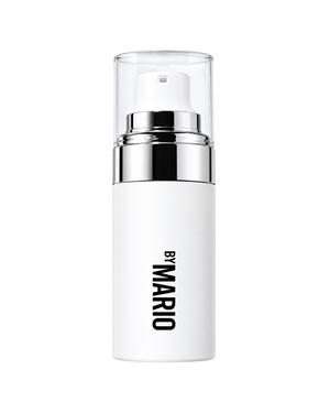 A white cosmetic pump bottle with a clear cap and a shiny silver collar, featuring the brand name 'BY MARIO' printed vertically in black on the front, set against a plain white background.
