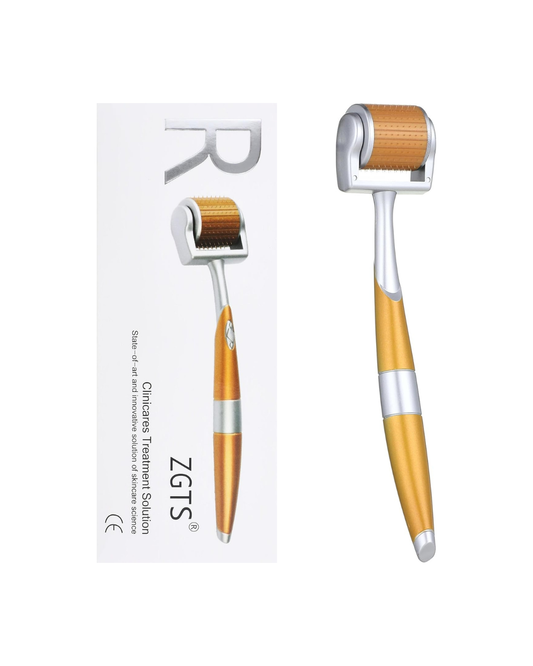 Gold and silver derma roller with packaging on a white background