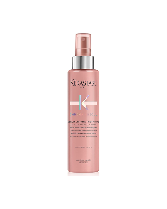 Kérastase hair care product bottle on a white background