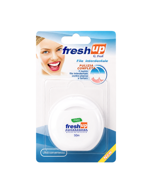 Packaging of freshup dental floss with a smiling woman on a white background