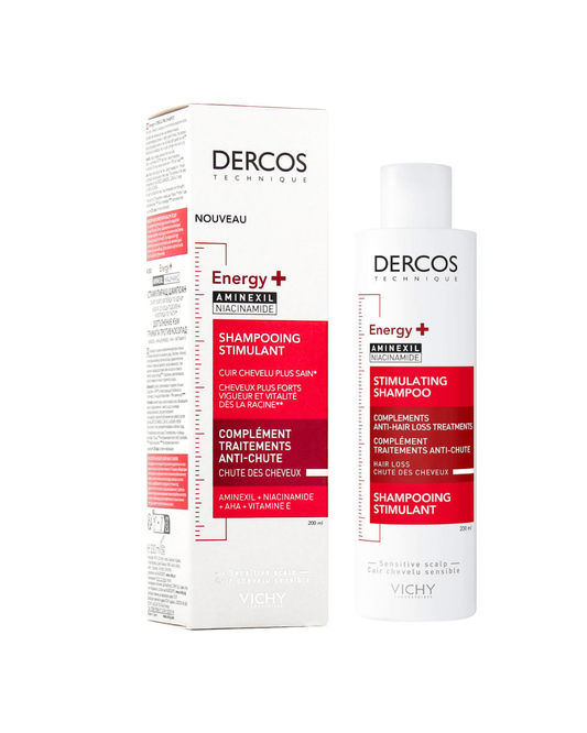 Dercos Technologique Energy + Aminele Stimulant Shampooing Shampoo bottle and packaging box, white with red and black accents, on a white background.