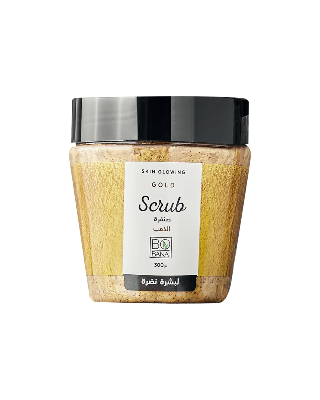 Jar of gold scrub with a black lid on a white background