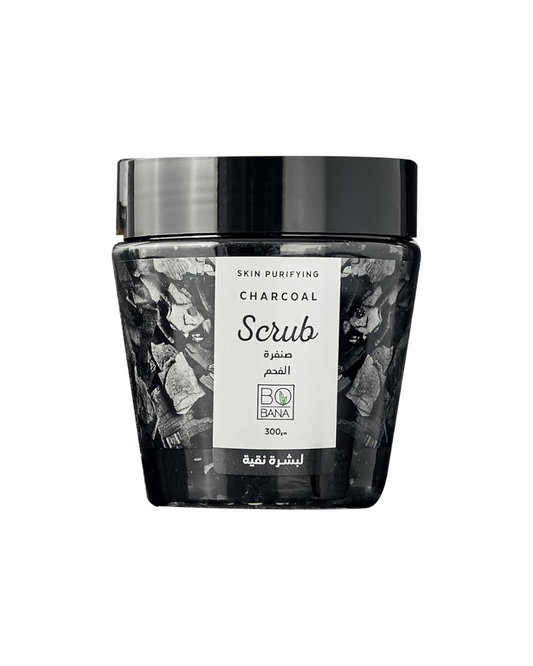 Jar of charcoal scrub with a black lid on a white background