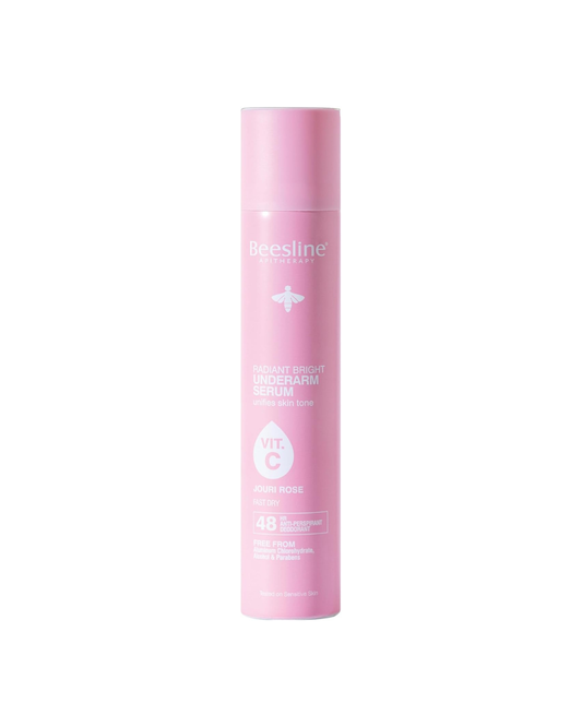 Pink bottle of Beesline deodorant on a white background