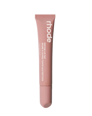 Rhode Retifique Lip Tint in a dusty rose pink squeeze tube with white text, shown against a plain white background.