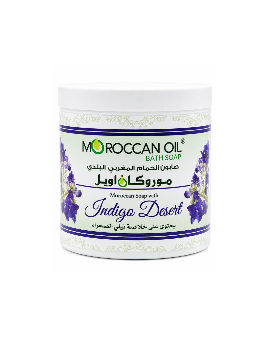 A white plastic jar of Moroccan Oil Bath Soap, specifically the 'Indigo Desert' variant, featuring a white label with purple and green accents and Arabic text.
