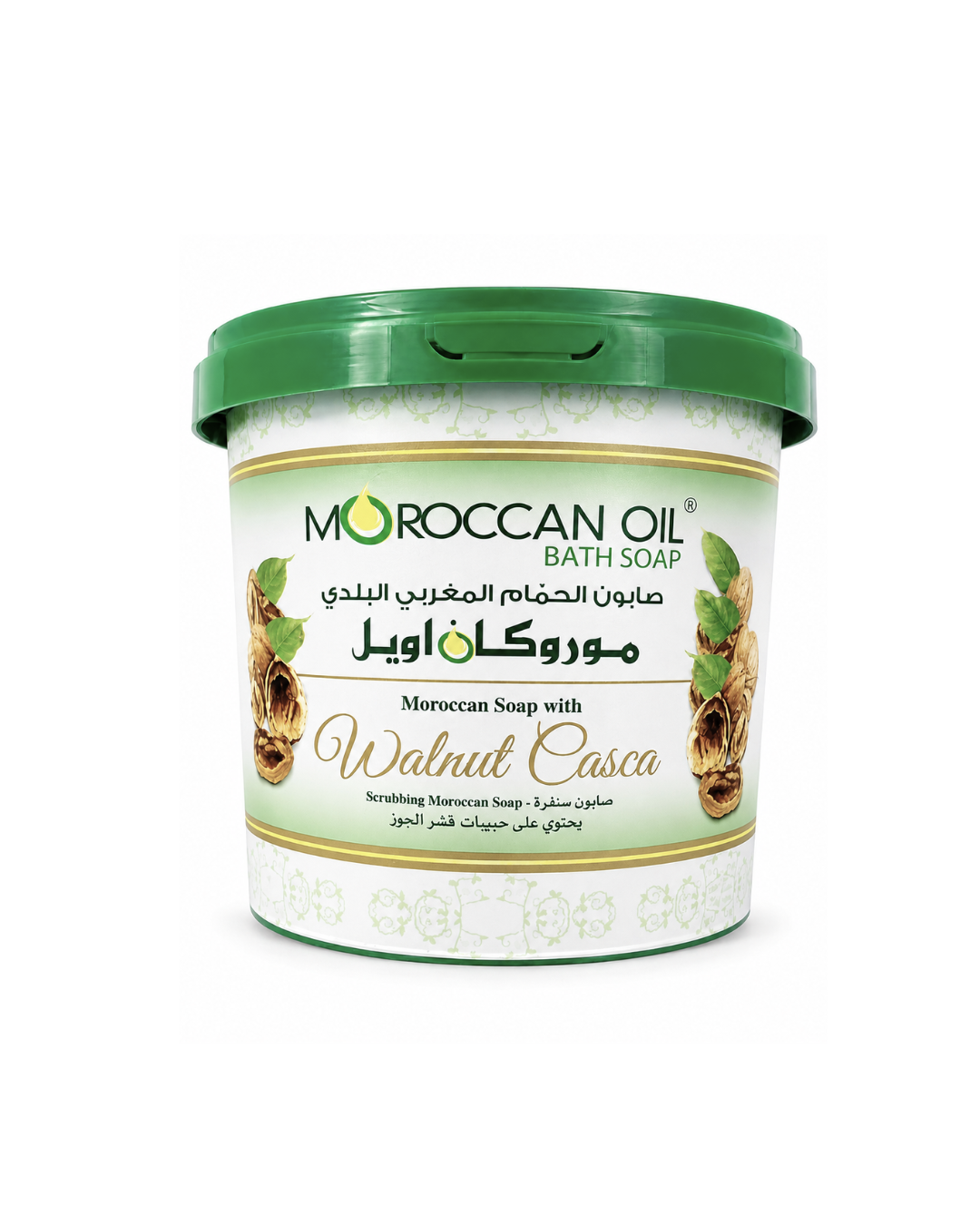 A tub of Moroccan Oil Bath Soap, Moroccan Soap with Walnut Casca, featuring a green lid and a white label with green and gold accents, set against a plain white background.