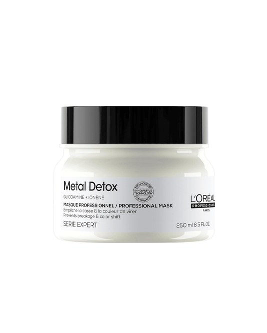 L'Oreal Serie Expert Metal Detox mask jar with white glass shade and chrome finish on a white background