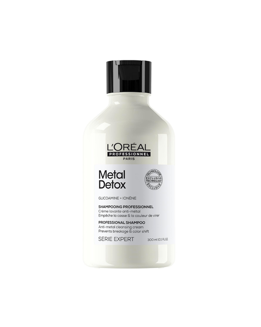 A 300 ml bottle of L'Oréal Professionnel Paris Metal Detox Professional Shampoo, featuring a white bottle with a black cap and black text on the label, set against a plain white background.